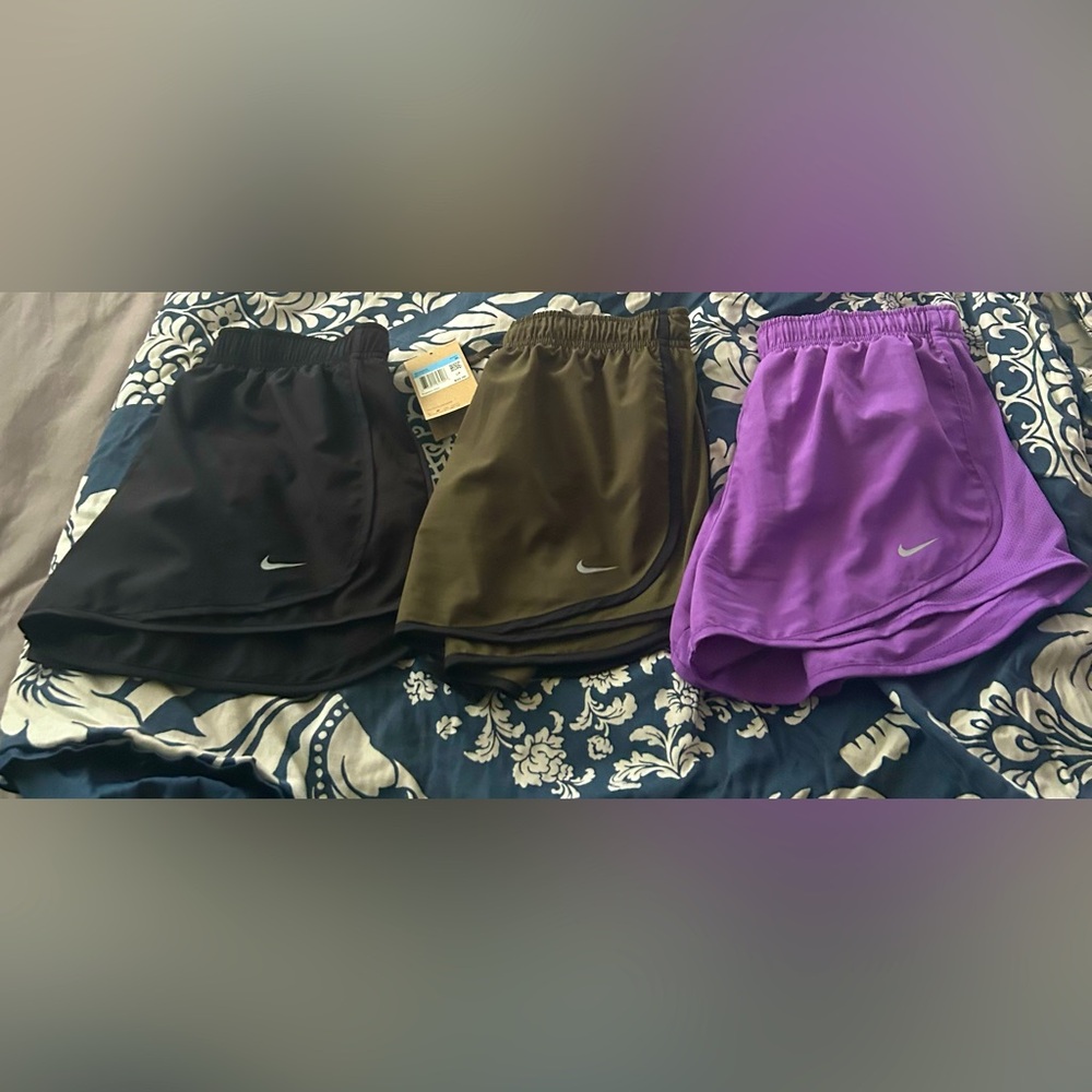 Size medium Nike shorts one NWT the other 2 only worn once